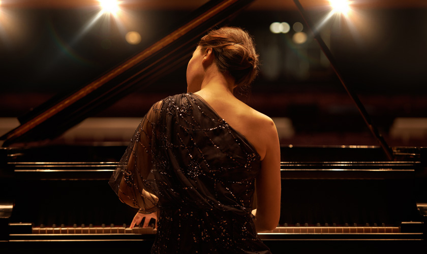 woman playing a perfectly tuned piano in North Adelaide
